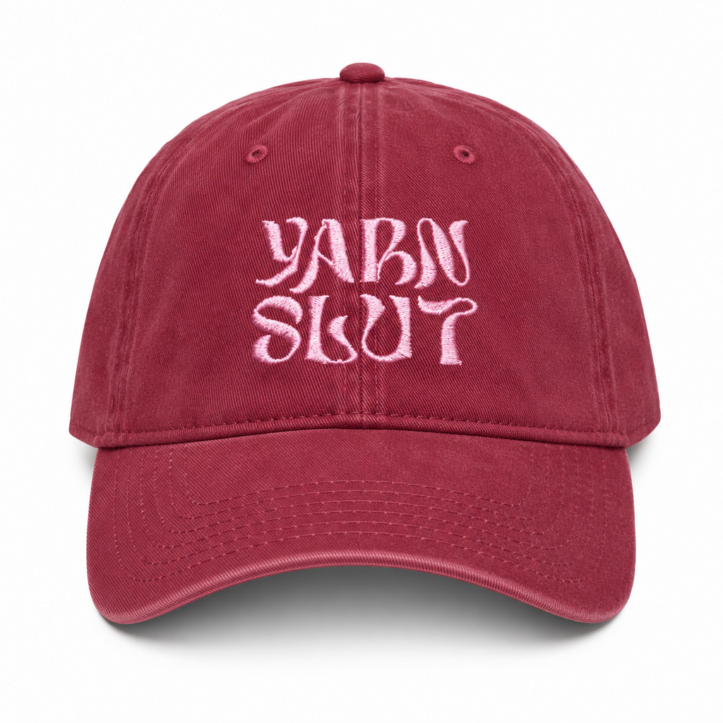 Burgundy cotton dad hat with light pink Yarn Slut embroidery
