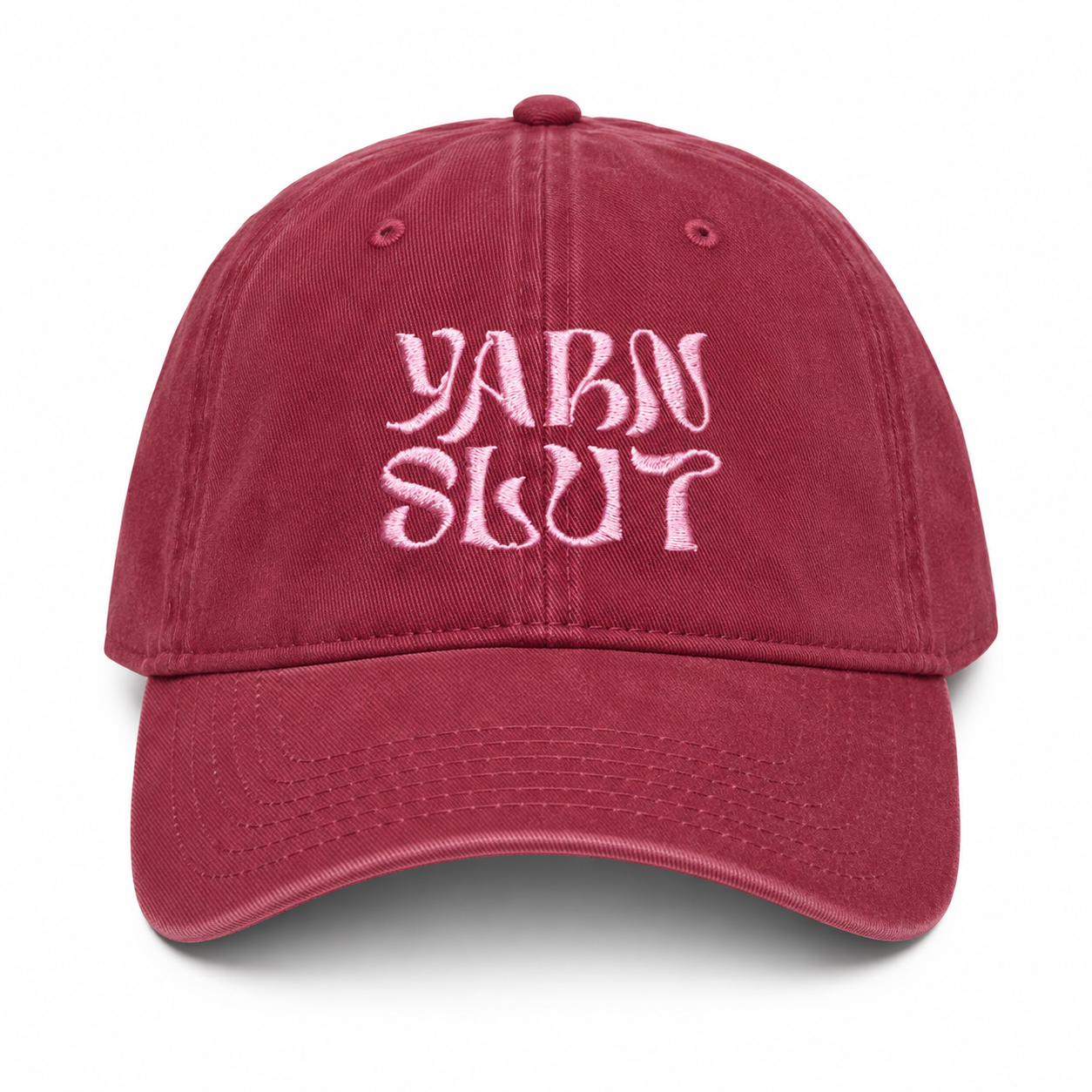 Burgundy cotton dad hat with light pink Yarn Slut embroidery