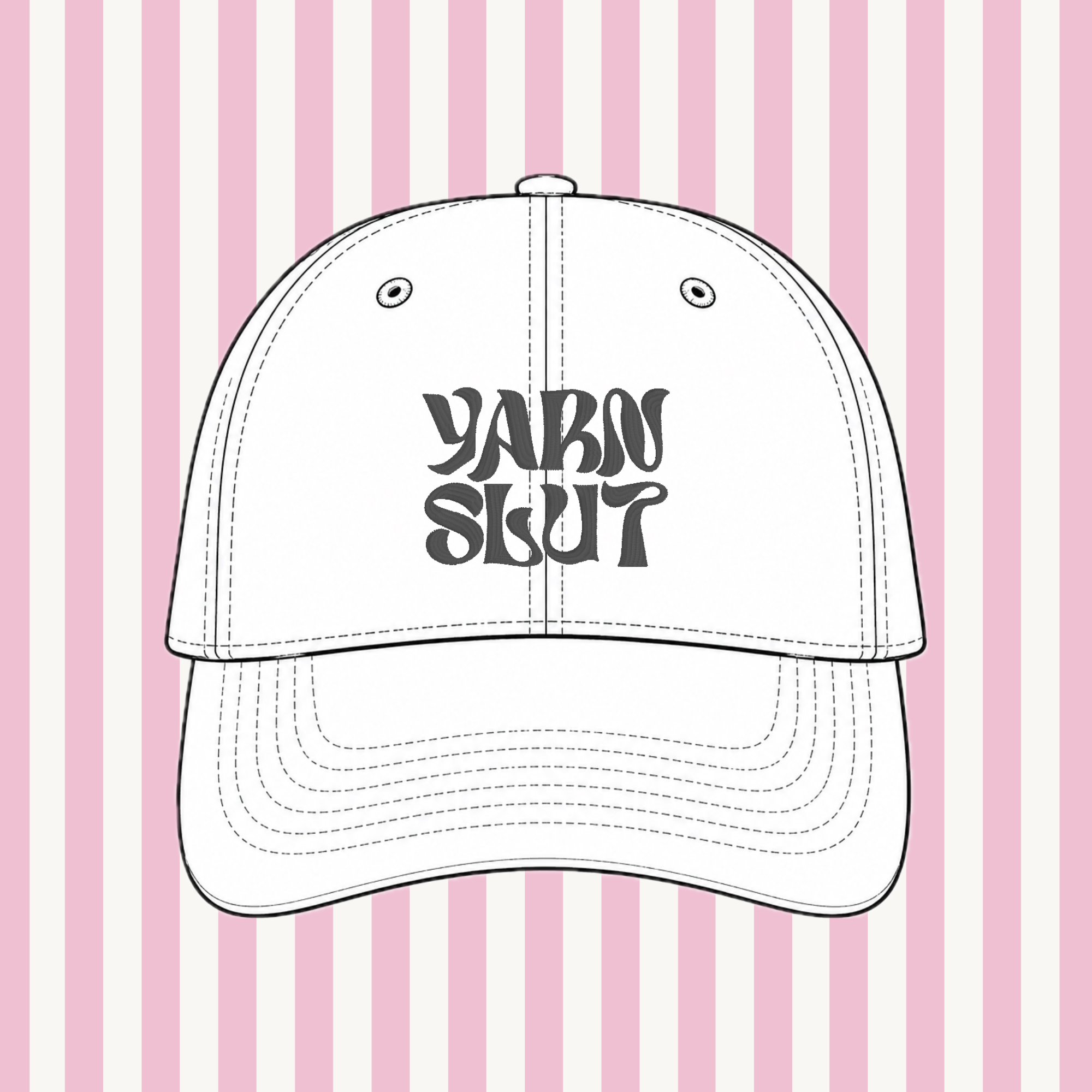 White hat mockup with charcoal upside-down Yarn Slut embroidery on a pink striped background